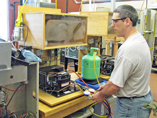 Student working on refrigeration