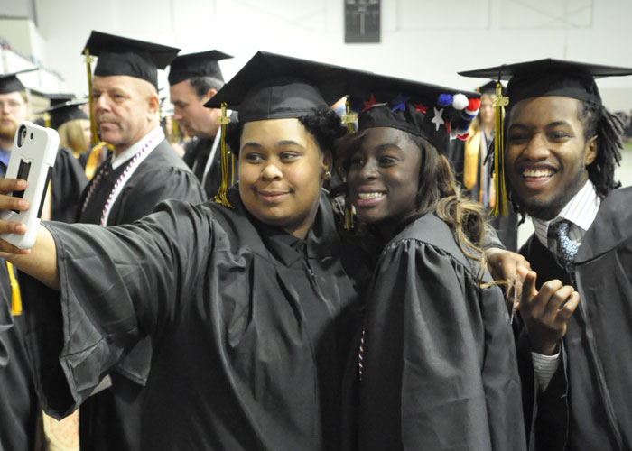 graduates in cap and gown