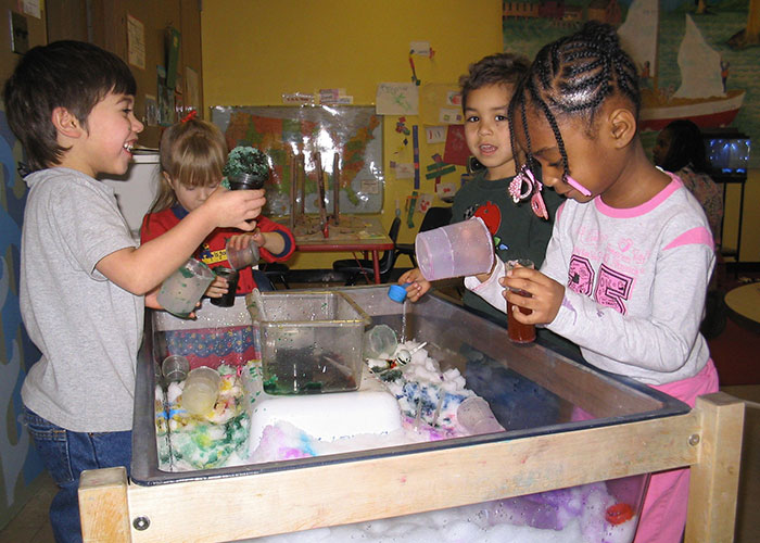 children engaging in water play