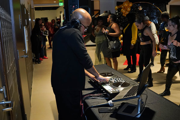 DJ Brian Larkin keeps the people moving on the dance floor.