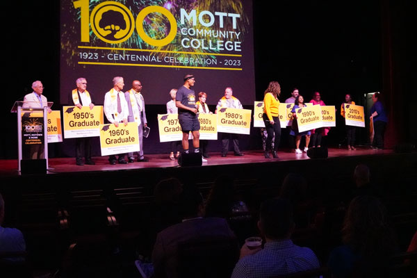 The Alumni through the decades on stage.