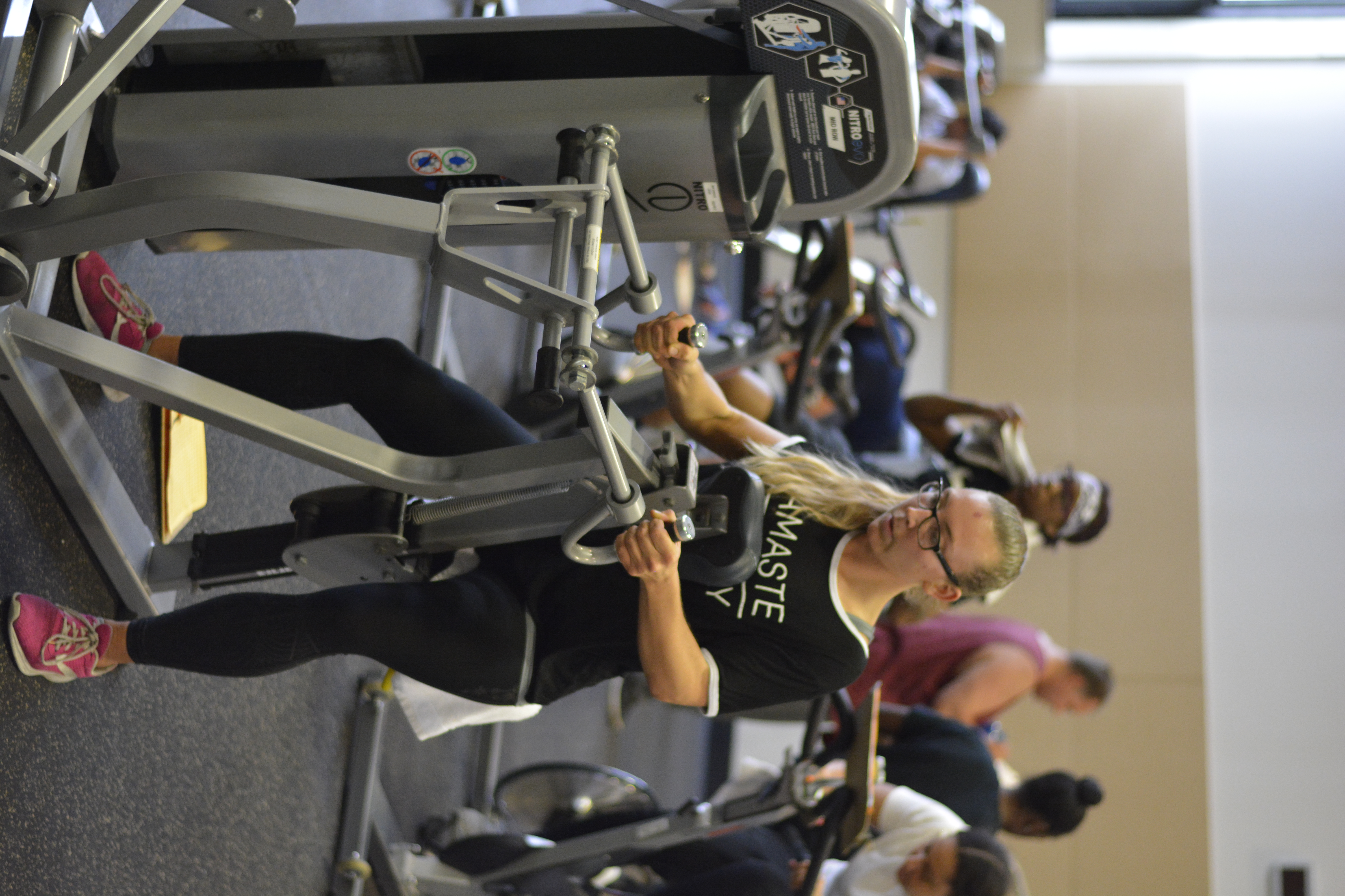 student using fitness equipment