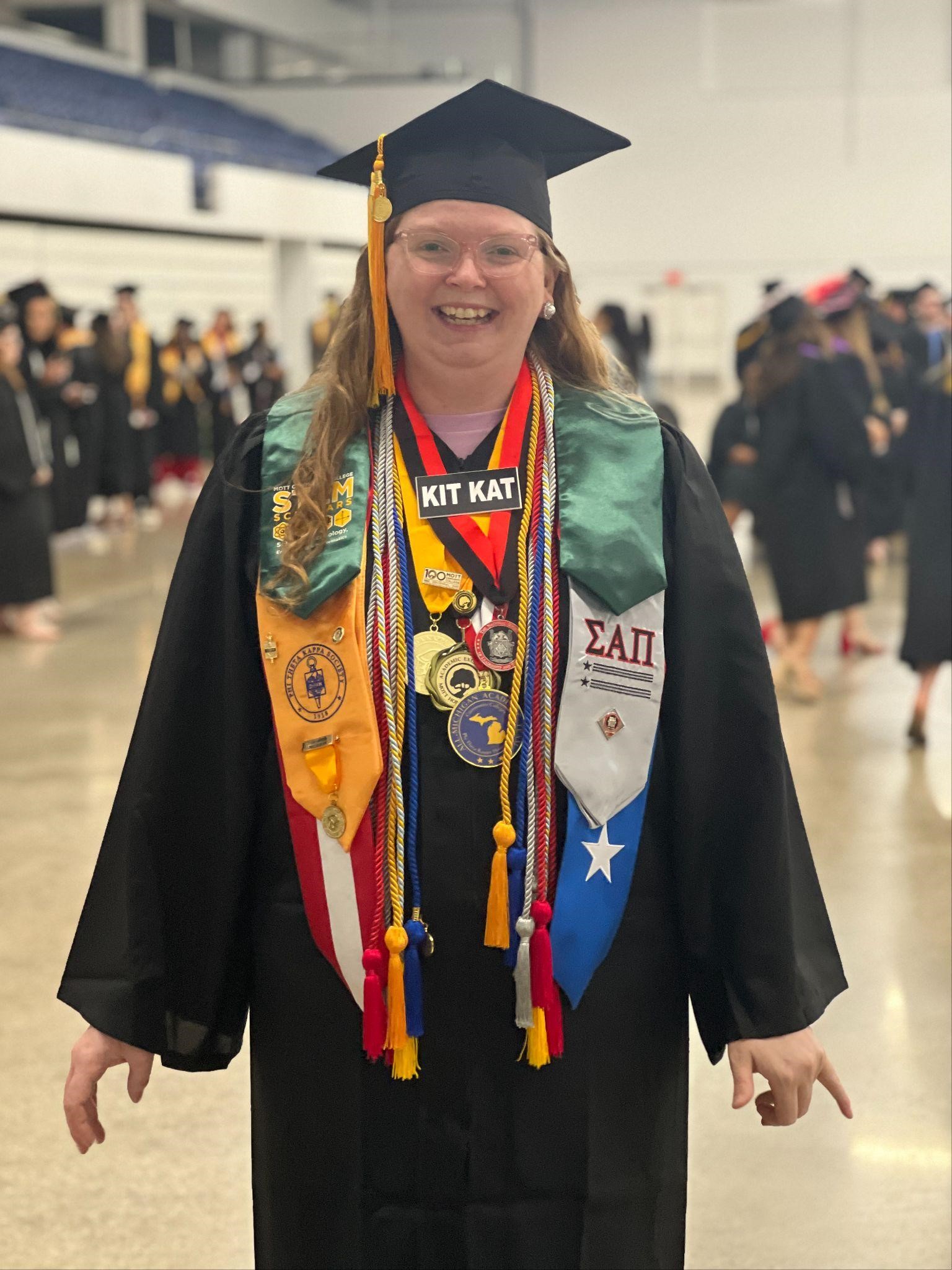 Honor grad with much regalia