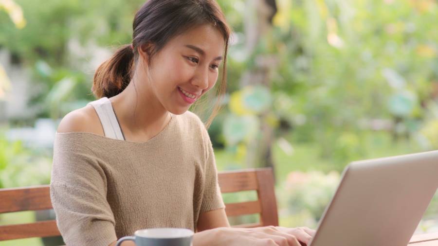 student looking at laptop