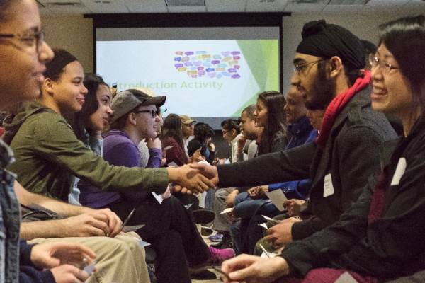 international students doing speed introductions at event