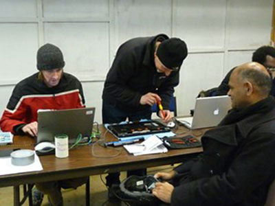 Computer Repair Technicians helping client