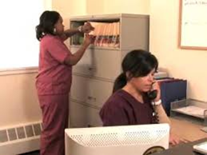 Two female medical workers in an office environment