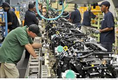 Workers on an assembly line